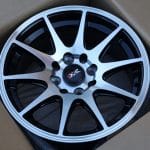 14x6.5 4x100 - 4x108 ET28 73.1 Black Machined Face