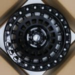 17x9 5x130 ET-25 84.1 MATTE BLACK + GLOSS BLACK RING